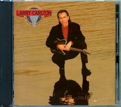 LARRY CARLTON «On Solid Ground» (DE 1989 MCA Records, Inc. • MCAD-6237)